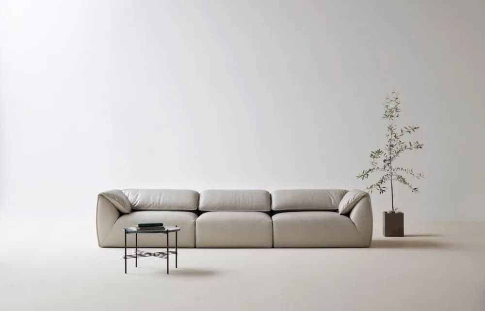 3D render of a minimal beige sofa