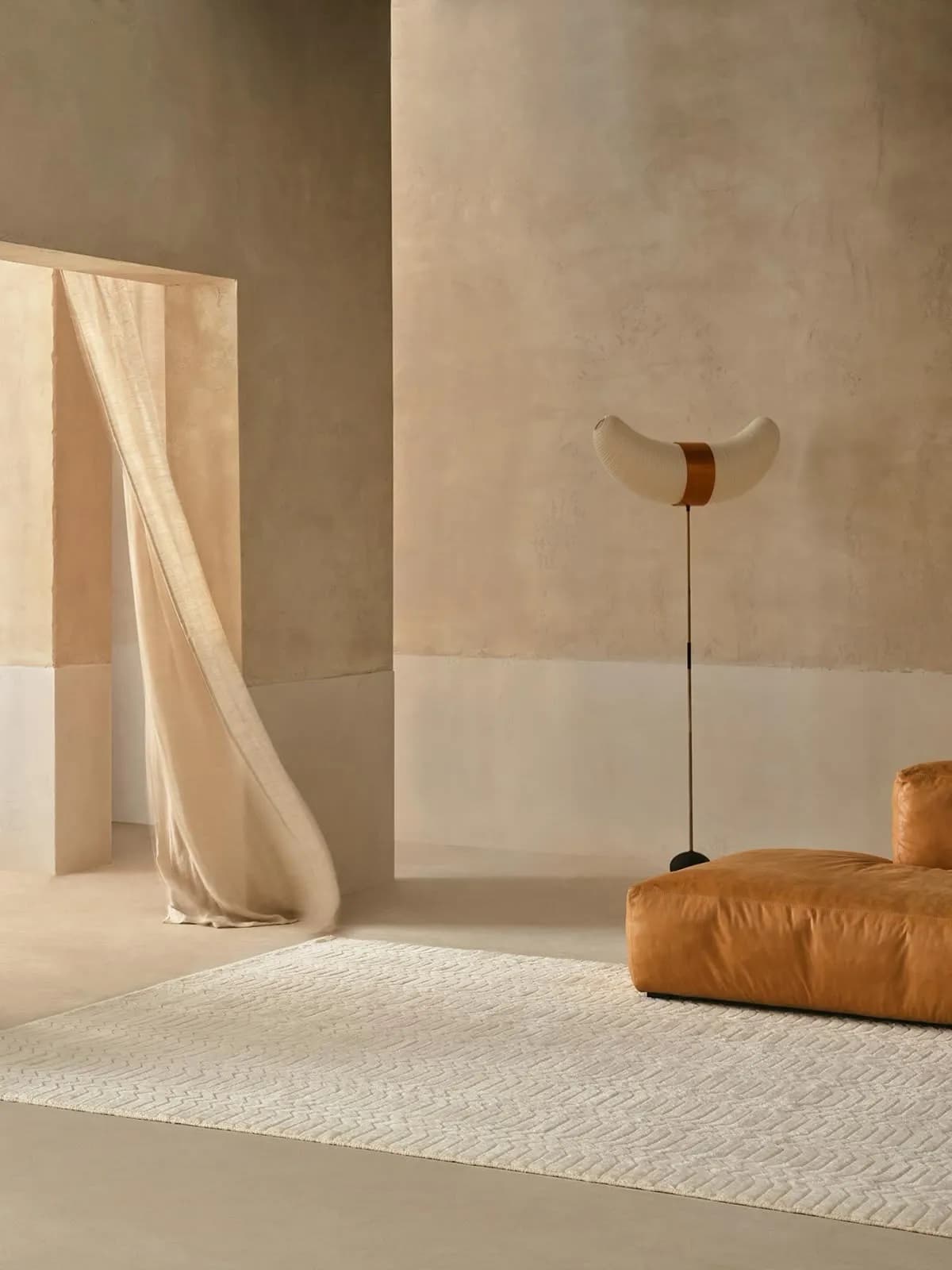 Warm-toned room with sculptural furniture